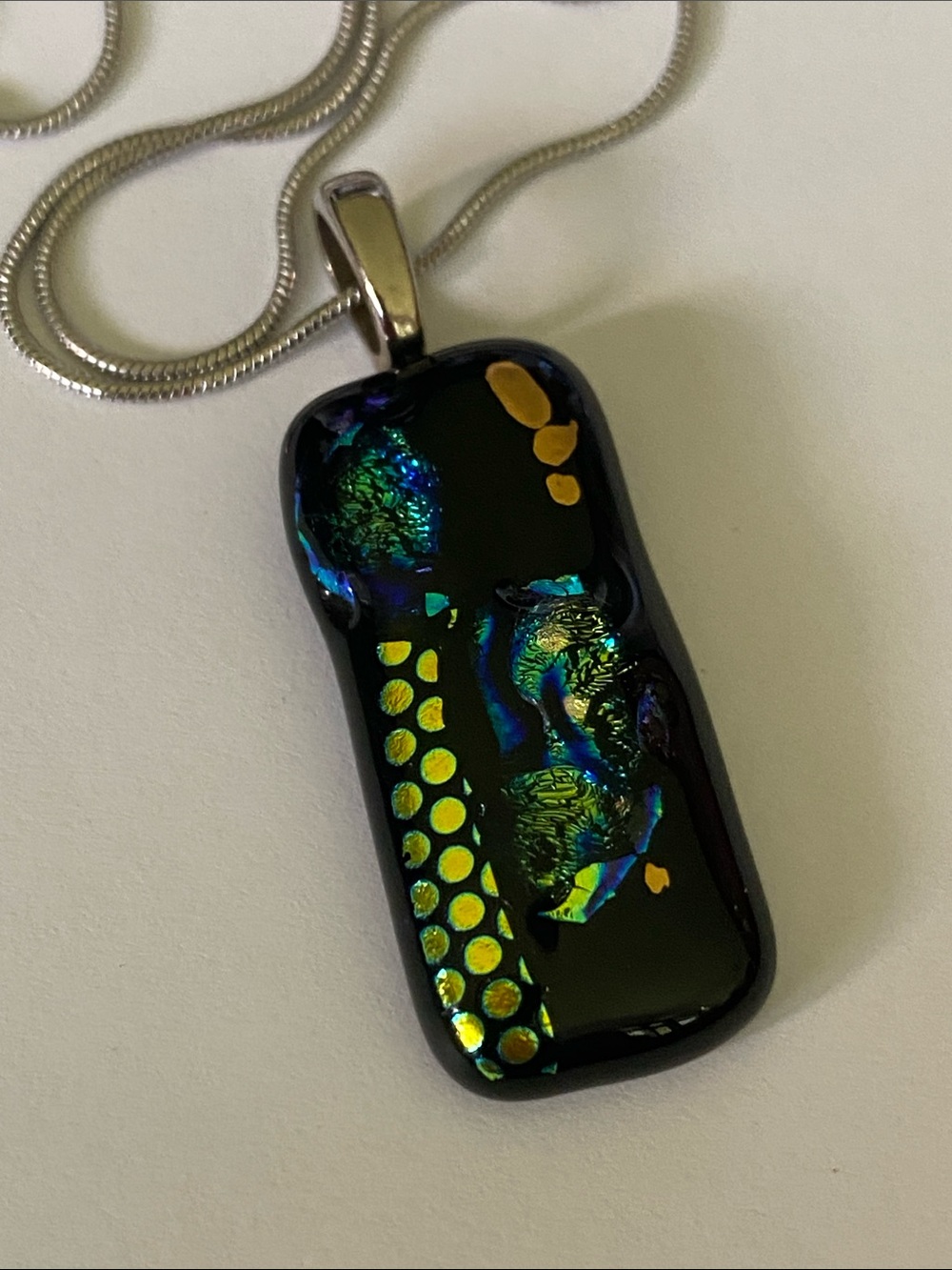 Artisan Black Dichroic Glass Pendant with Iridescent Blue-Green and Gold Accents